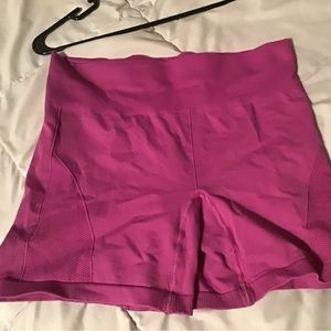 Lululemon biker shorts, purplish pink